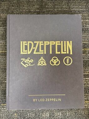 Led Zeppelin by Led Zeppelin hardcover collectible book.